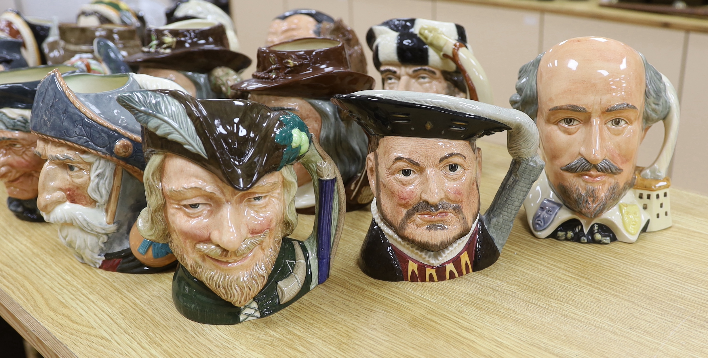 Fifteen Royal Doulton character jugs including Henry VIII D6642, Catherine Howard D6645, Sir Francis Drake D6805, etc., highest 18cm